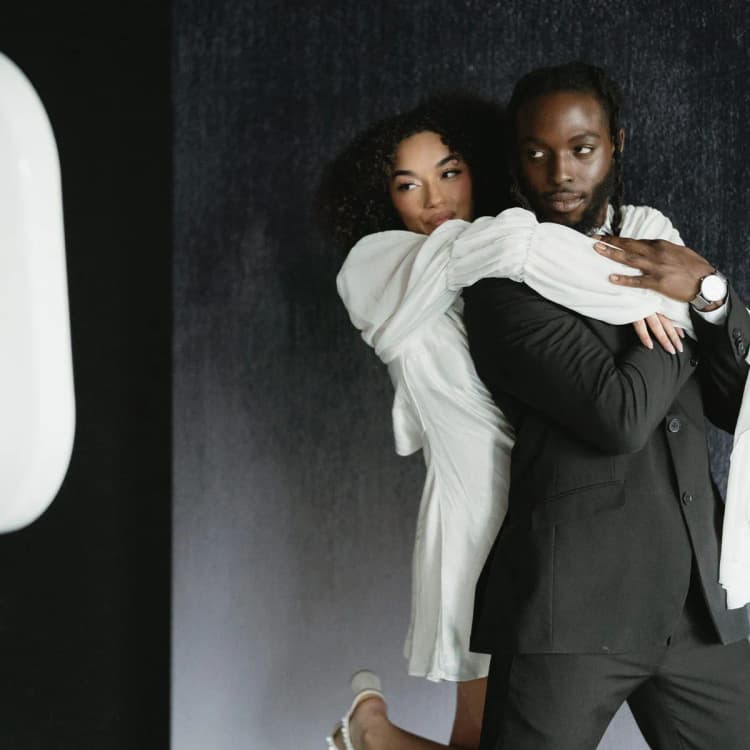 Couple posing at a digital photo booth at Los Angeles wedding