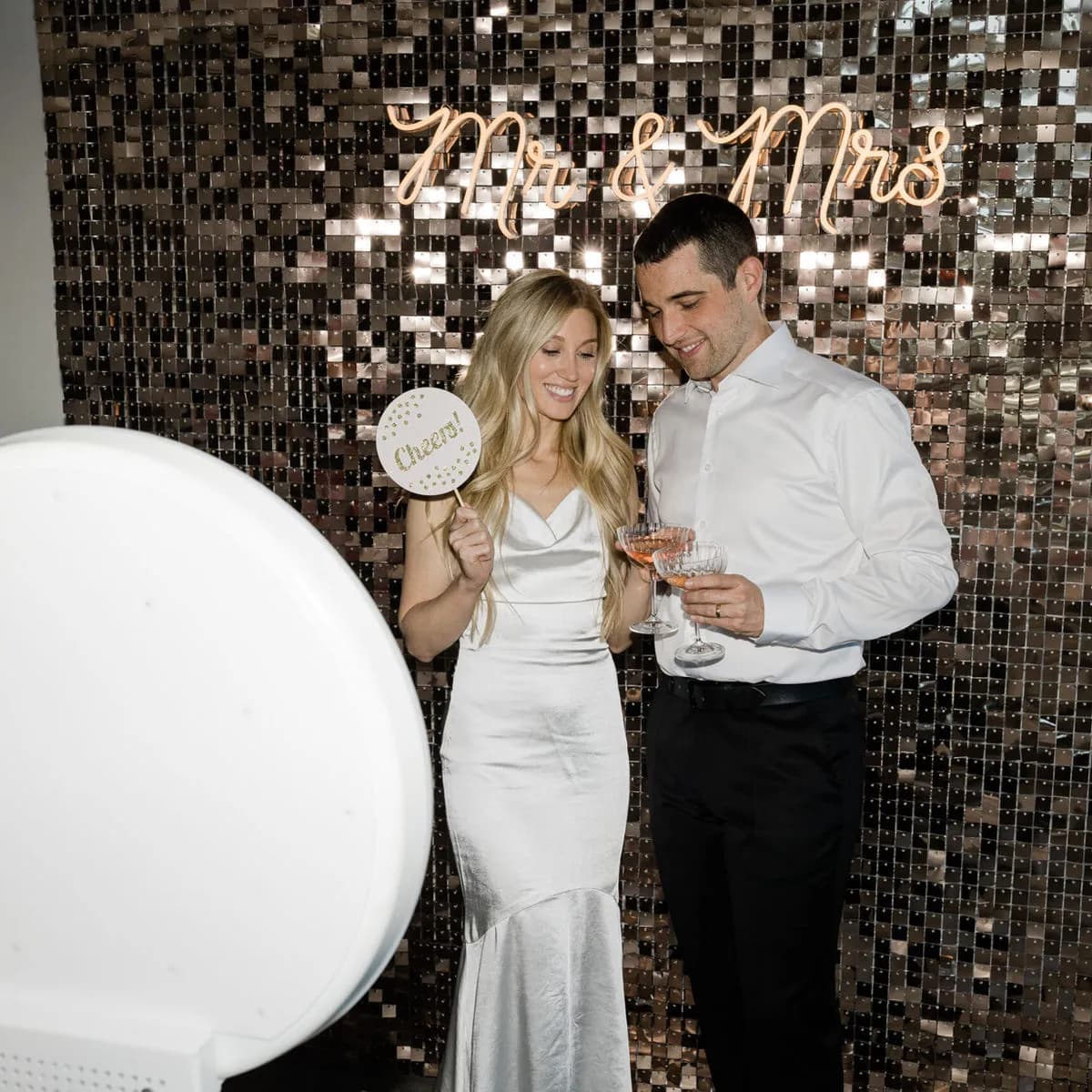 Wedding photo booth prints banner showcasing Los Angeles events — Captured Celebrations