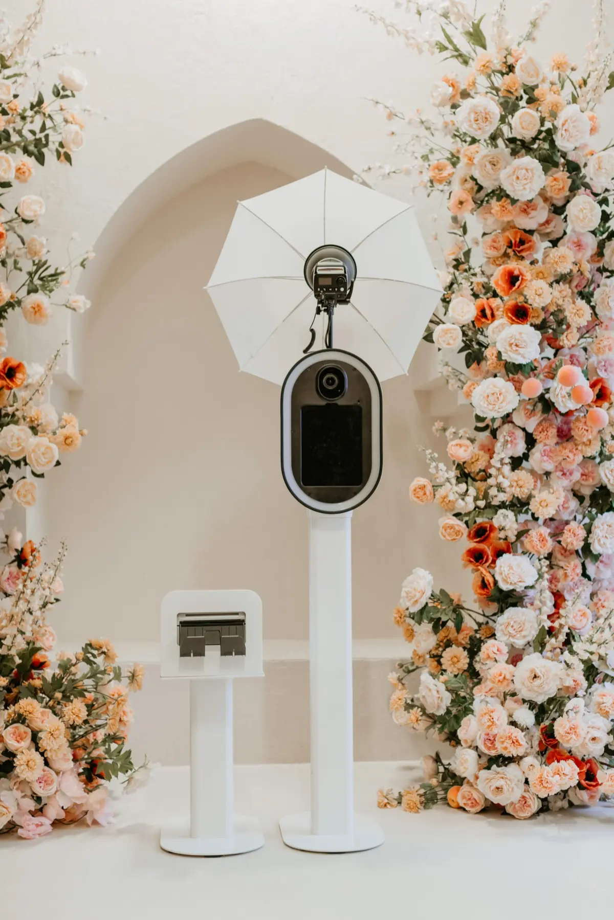 Peachy themed photo booth capturing warm moments at a community celebration