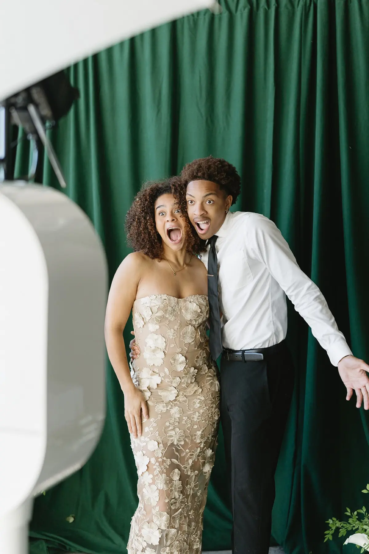 Velour floral green photo booth for quinceanera celebration