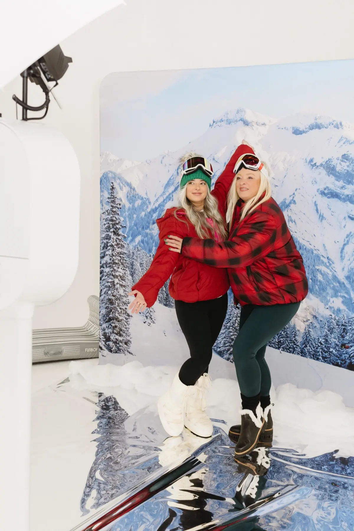 Winter apres ski themed photo booth with customized branding for a holiday event